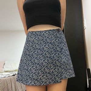 Small patterned skort
colours blue, white, and black